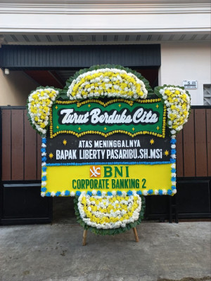 Papan Bunga Duka di Darma
