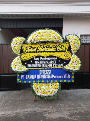 Papan Bunga Duka di Darma