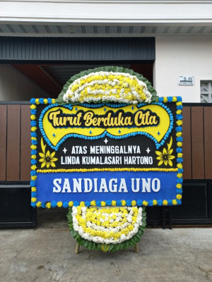 Papan Bunga Duka di Darma